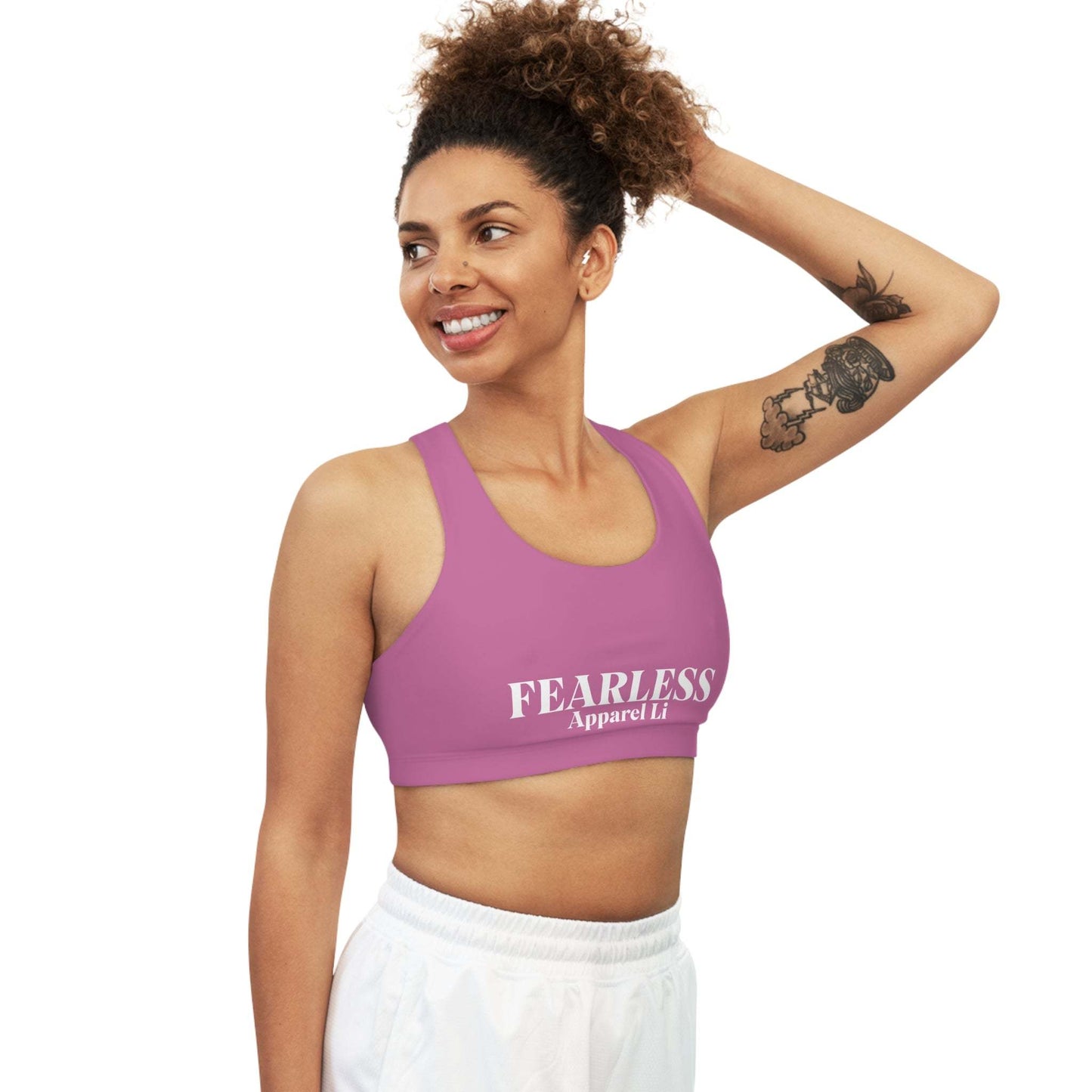 Seamless Sports Bra Fearlessli in pink, featuring moisture-wicking fabric and medium support for active women.