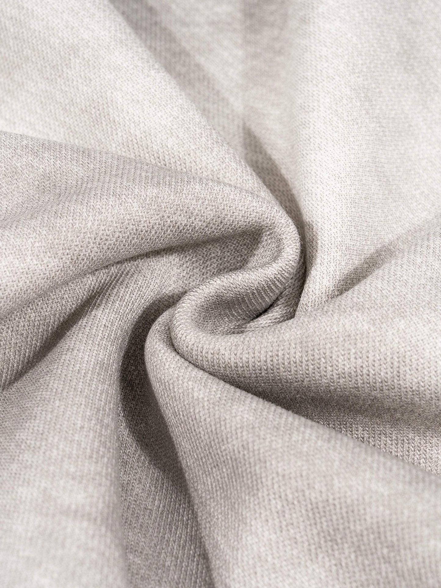 Close-up fabric texture of Dirty Washed Boxy Zip-up Fleece Hoodie, showcasing grey material blend.