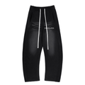 Sunfade Curved Blade Sweatpants in black with drawstring waist and "Fearless" logo.
