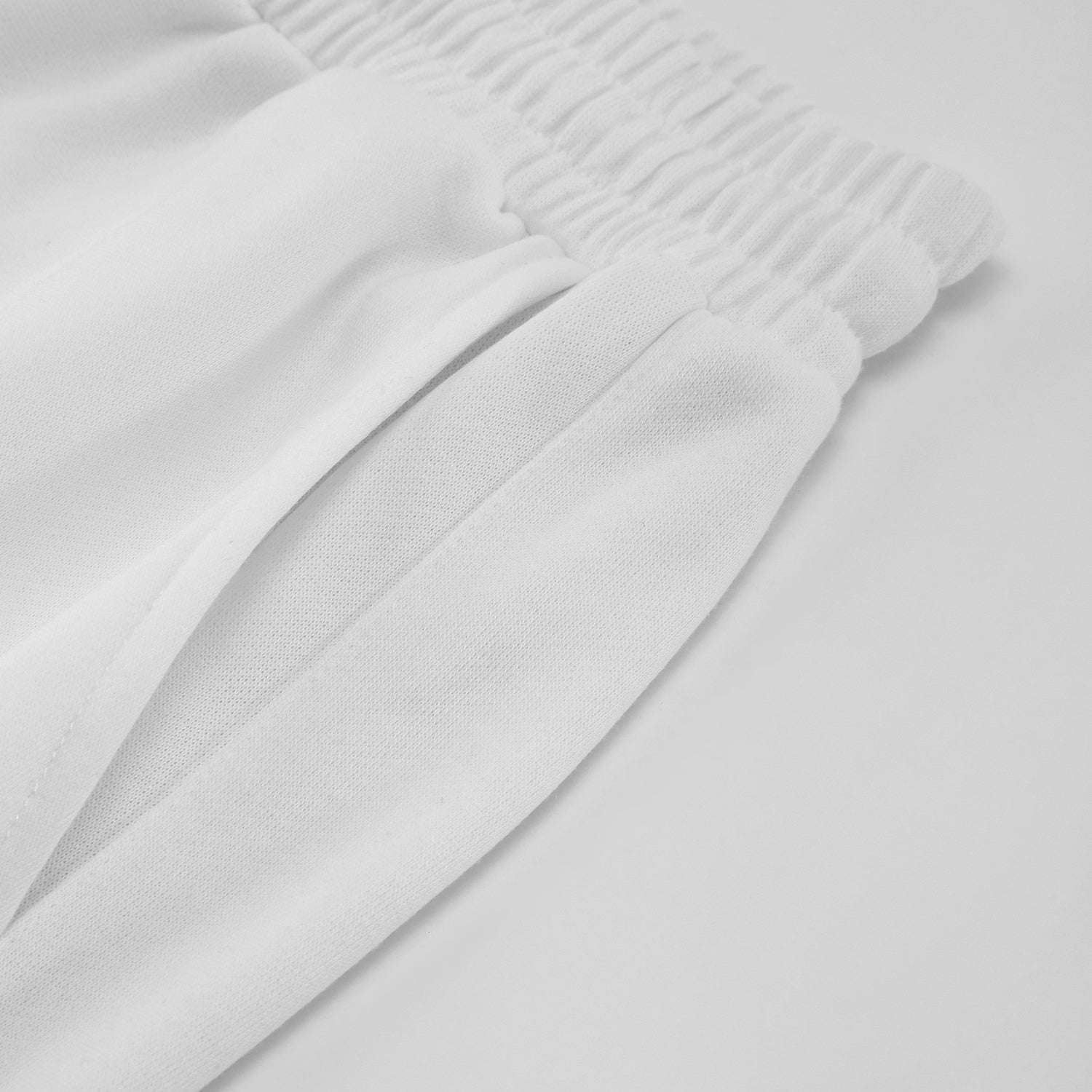 FearLessLI Unisex Drawstring Waist Joggers with adjustable waistband in lightweight fabric.