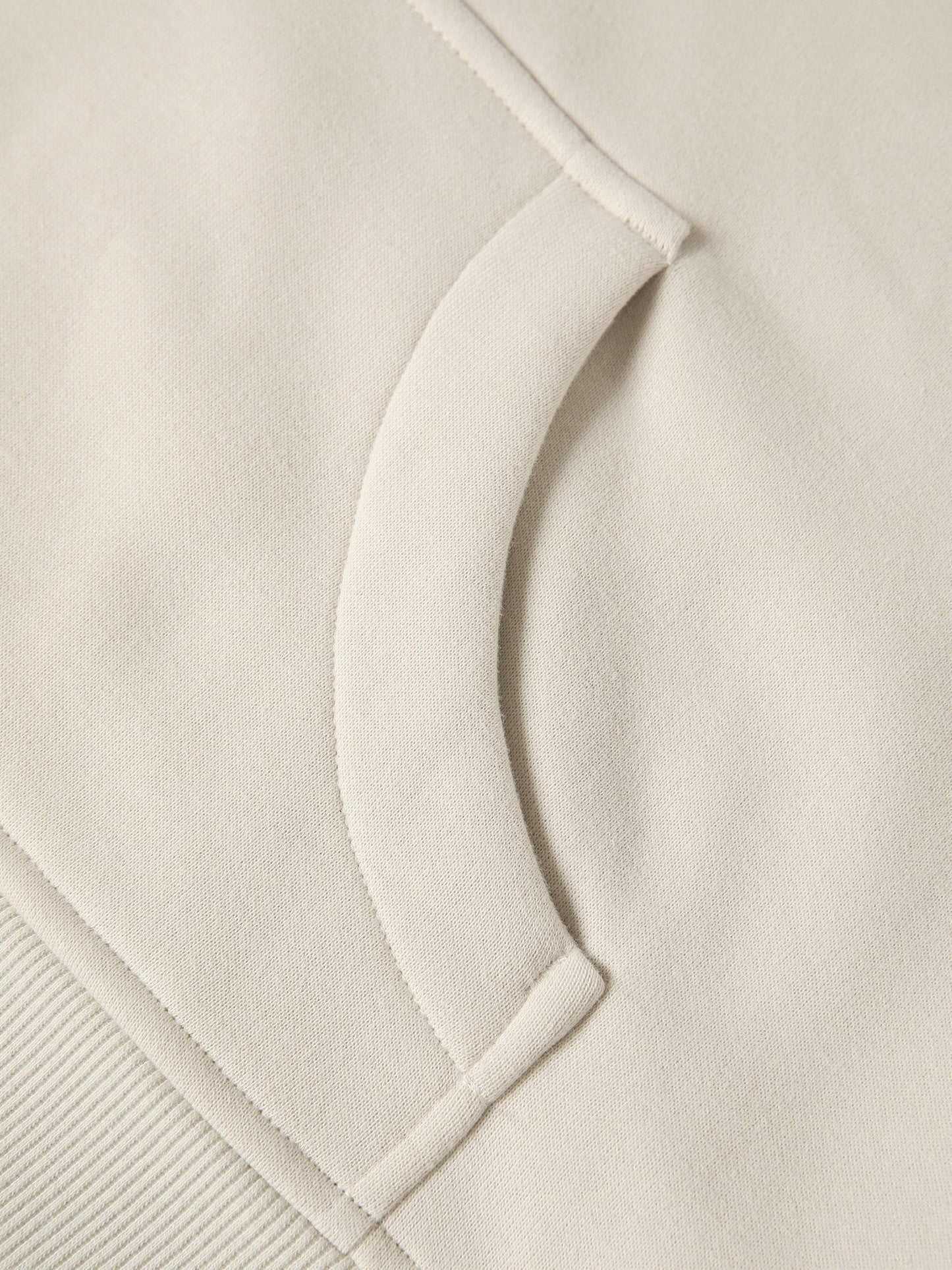 Close-up of the Detroit Lions FearlessLI Cropped Half-Zip Hoodie pocket.