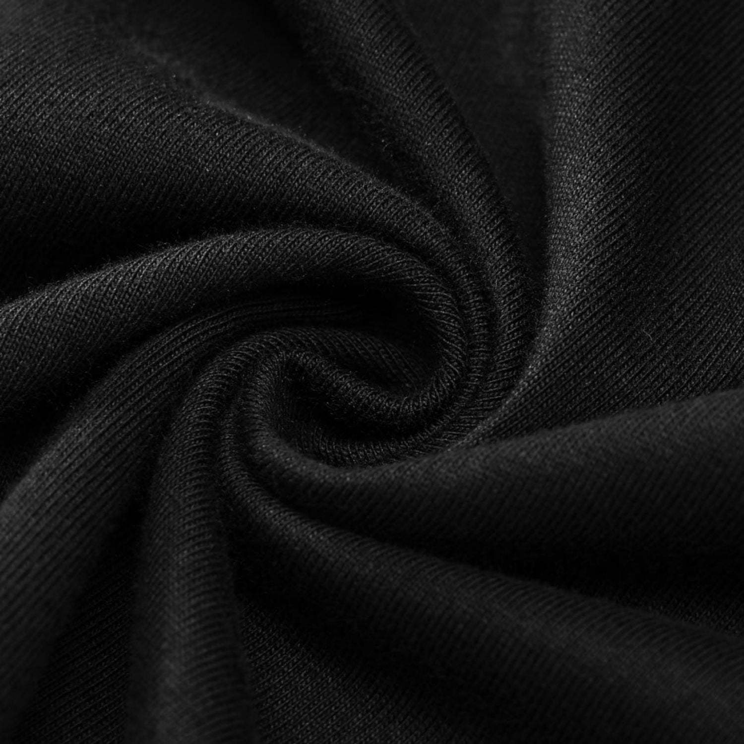 Close-up of black FearLessLi Hustle Drop Down T-Shirt fabric displaying texture and quality.