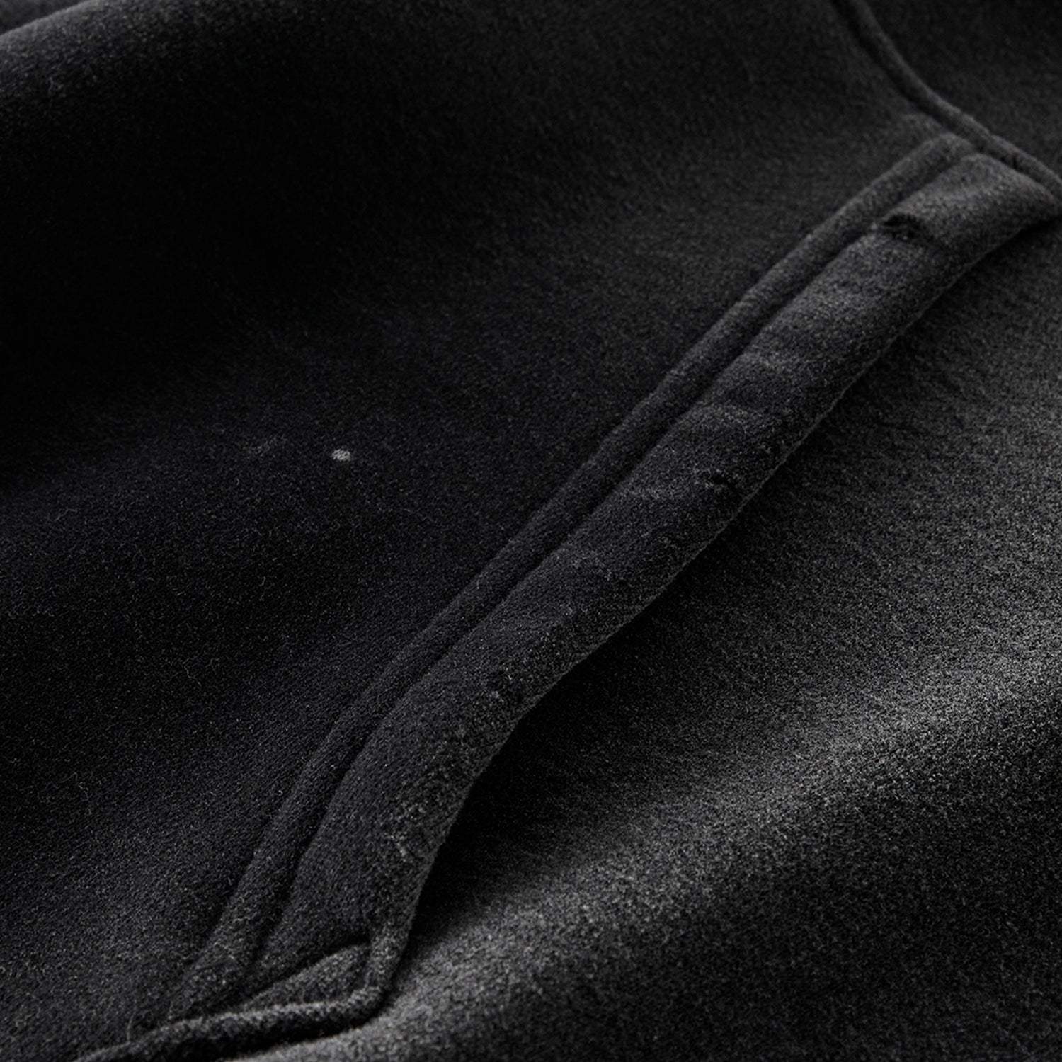 FearLessLi Vintage Wash Frayed Fleece Hoodie with vintage wash and frayed edges.