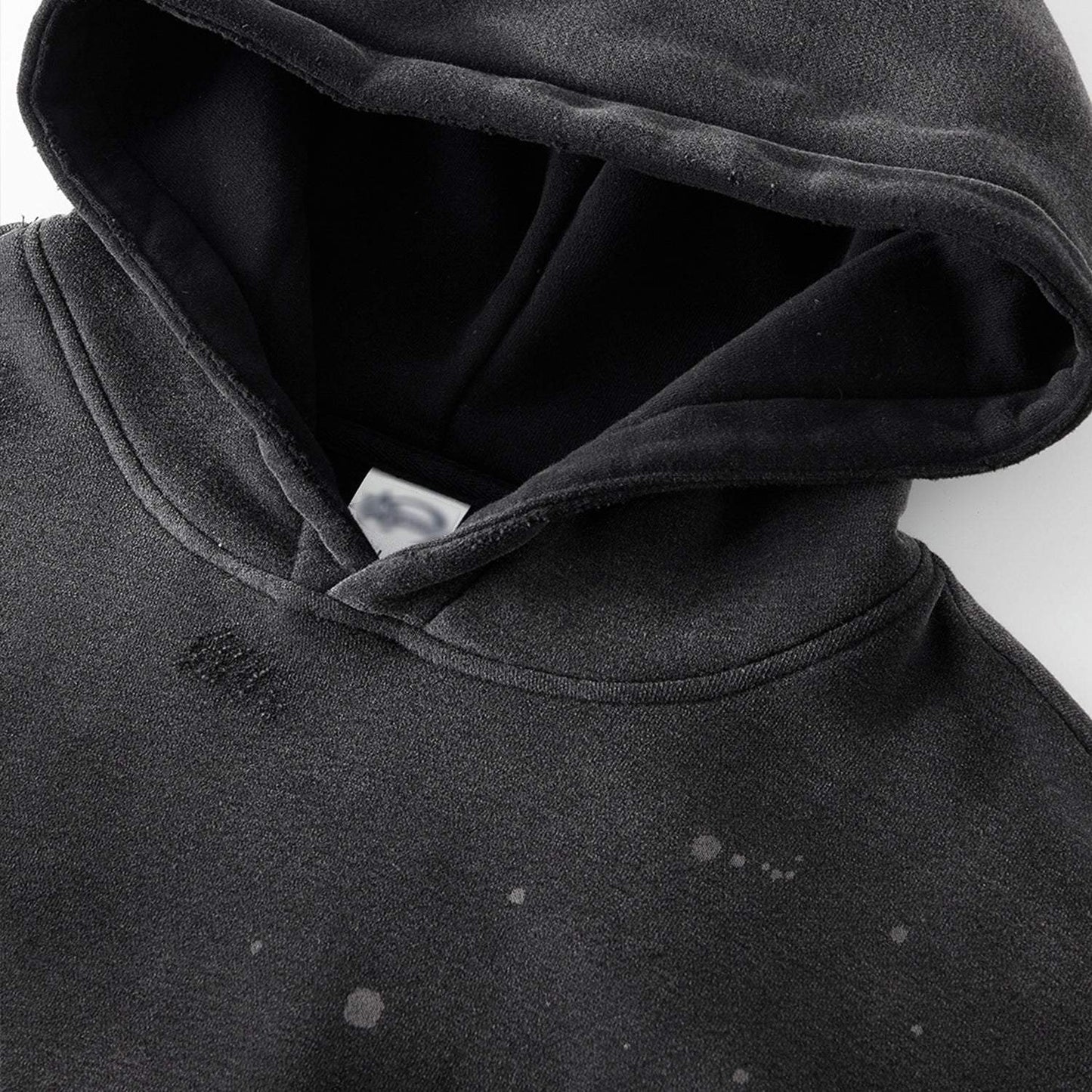 FearLessLi Vintage Wash Frayed Fleece Hoodie with distressed details and cozy design.