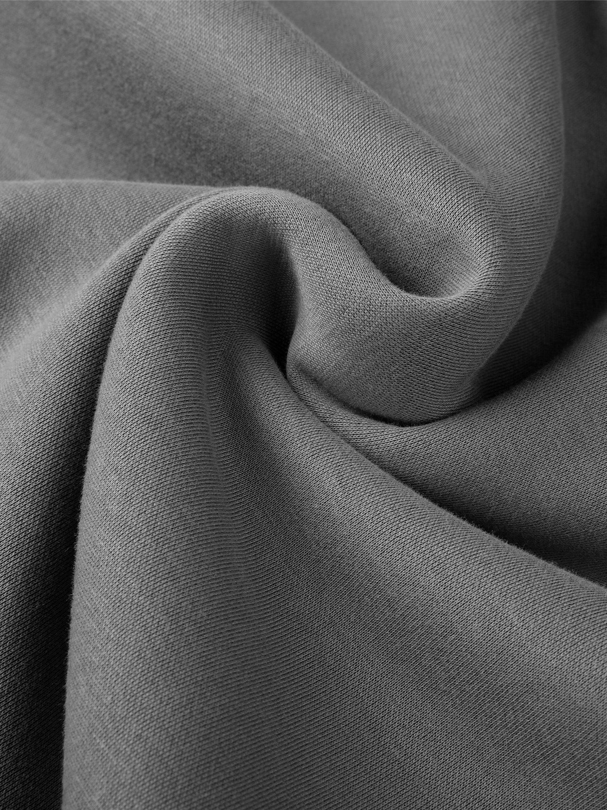 Close-up of grey fabric texture from Lions Fearless Apparel Line Raglan Sleeve Hoodie.