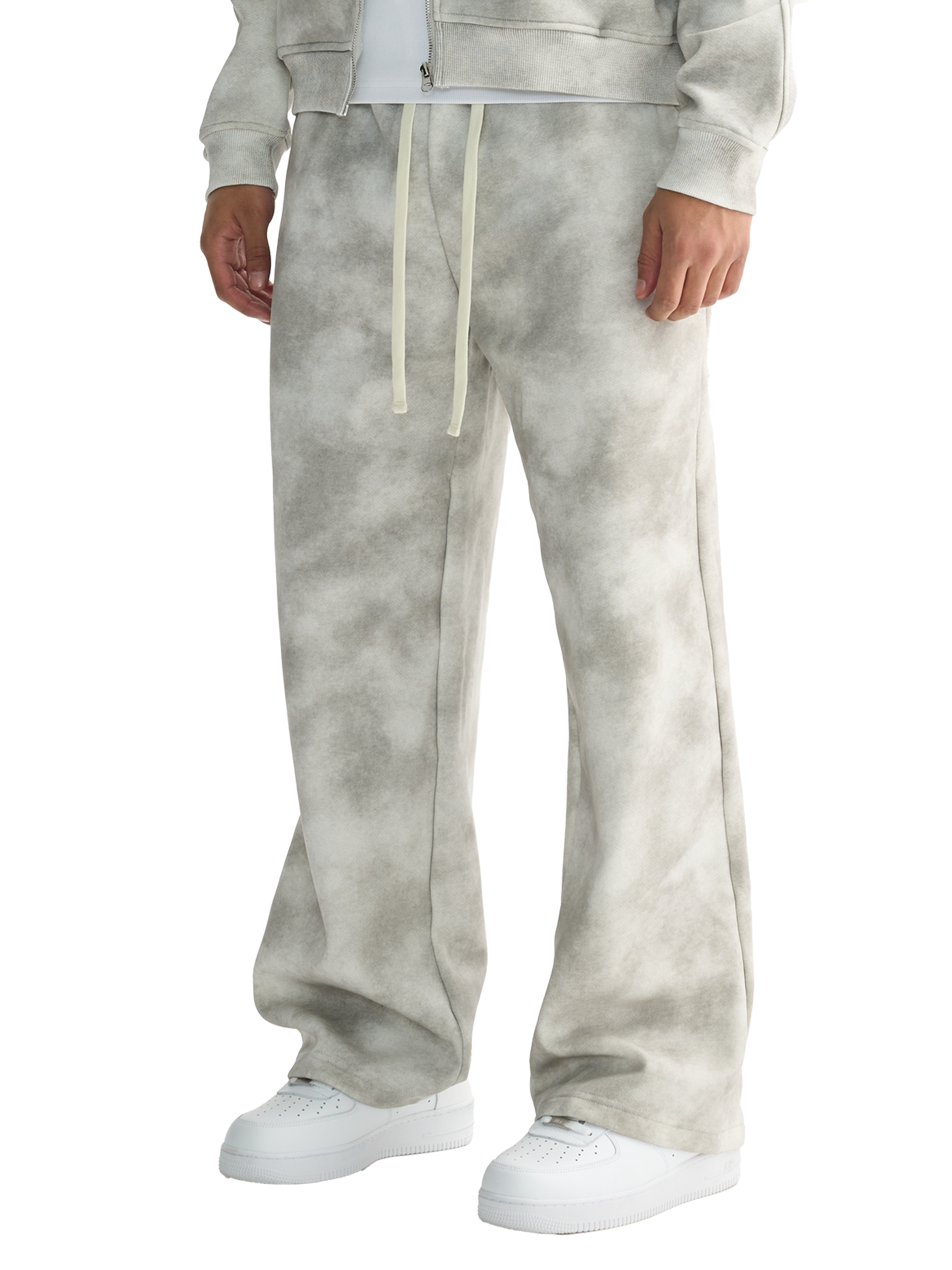 Dirty washed fleece sweatpants with relaxed fit and drawstring in versatile grey color.