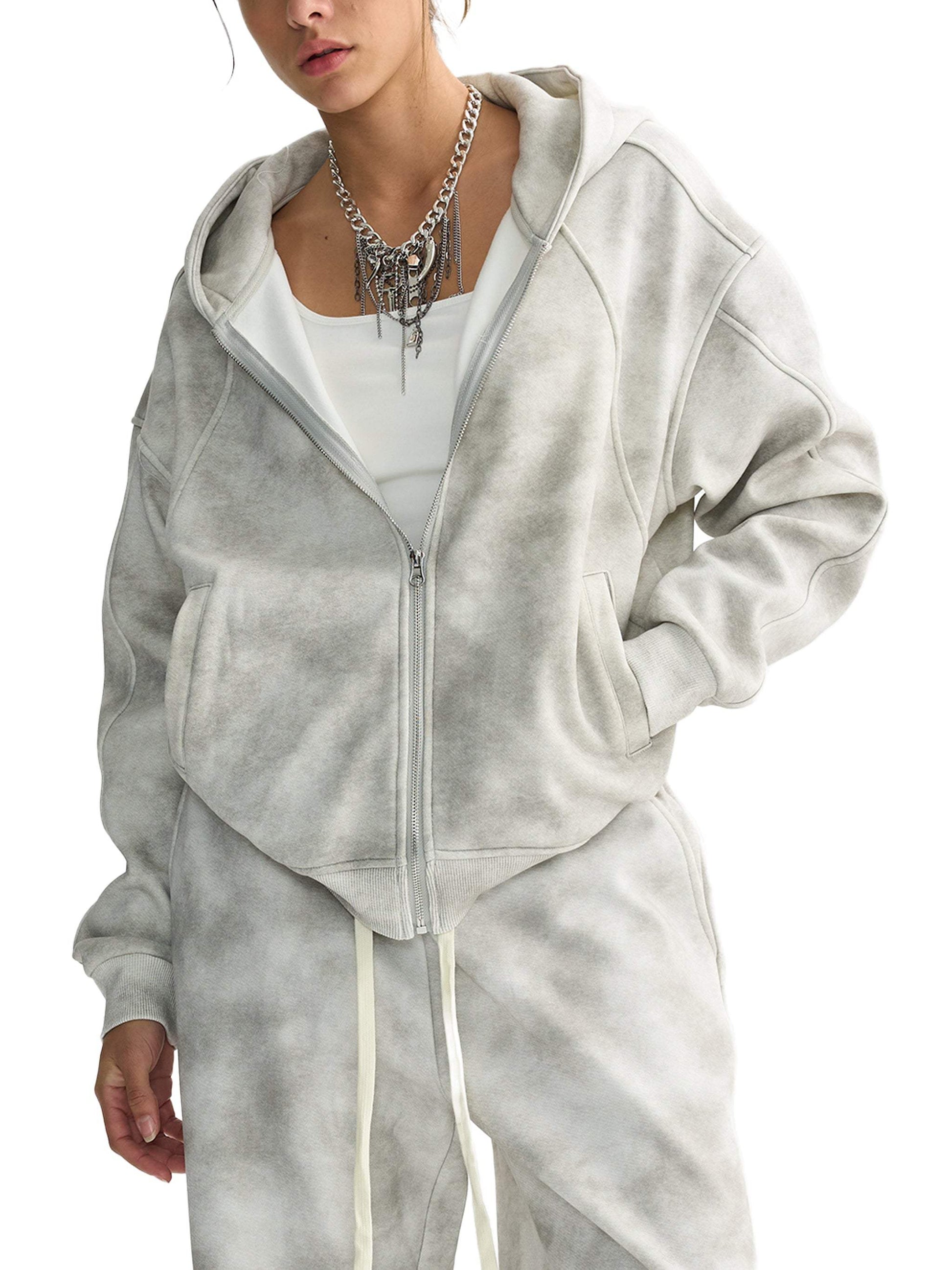 Unisex dirty washed boxy zip-up fleece hoodie in grey with hood and front pocket.