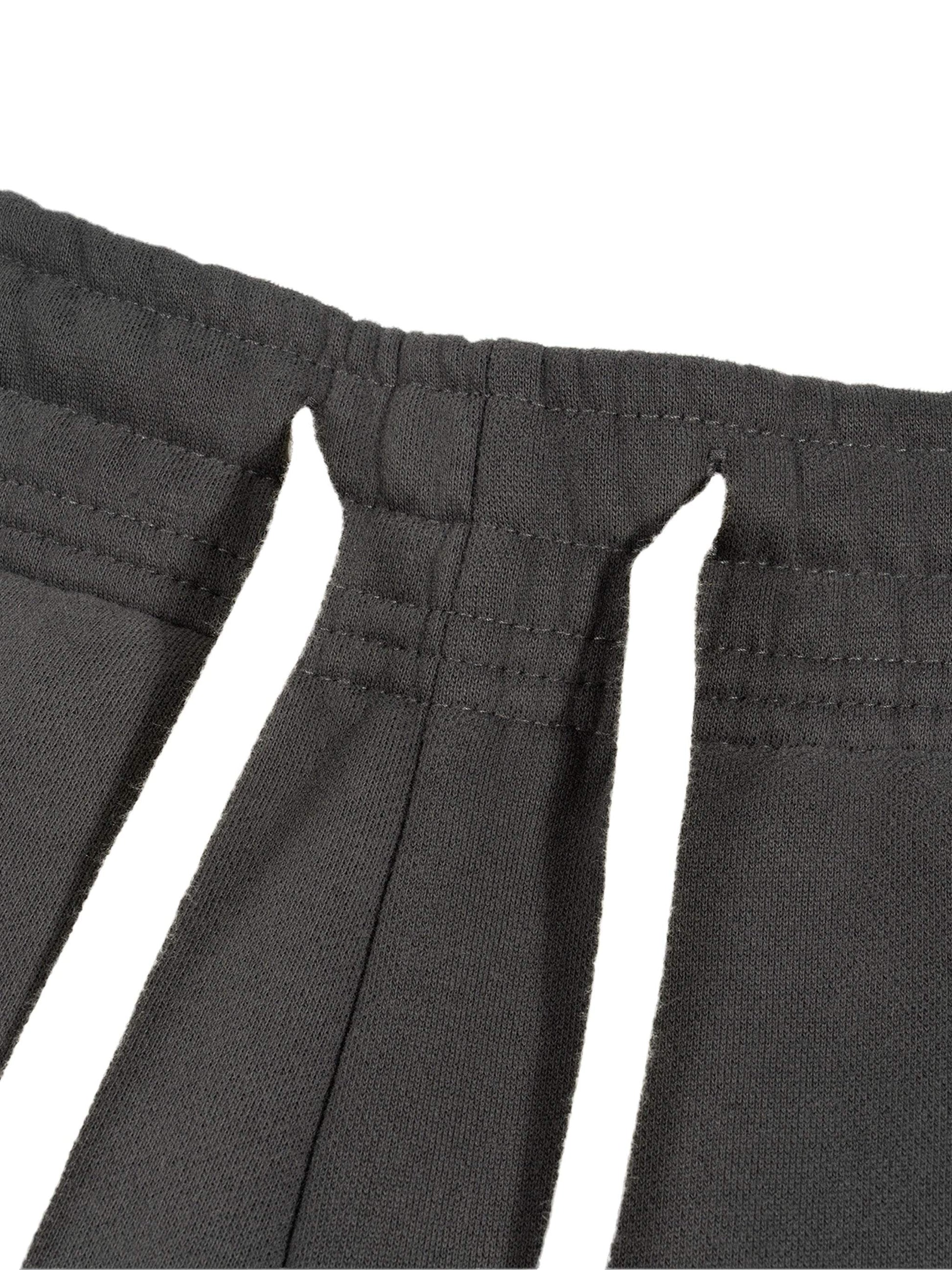 Sunfade Curved Blade Sweatpants in black showing waistband detail with stitching.