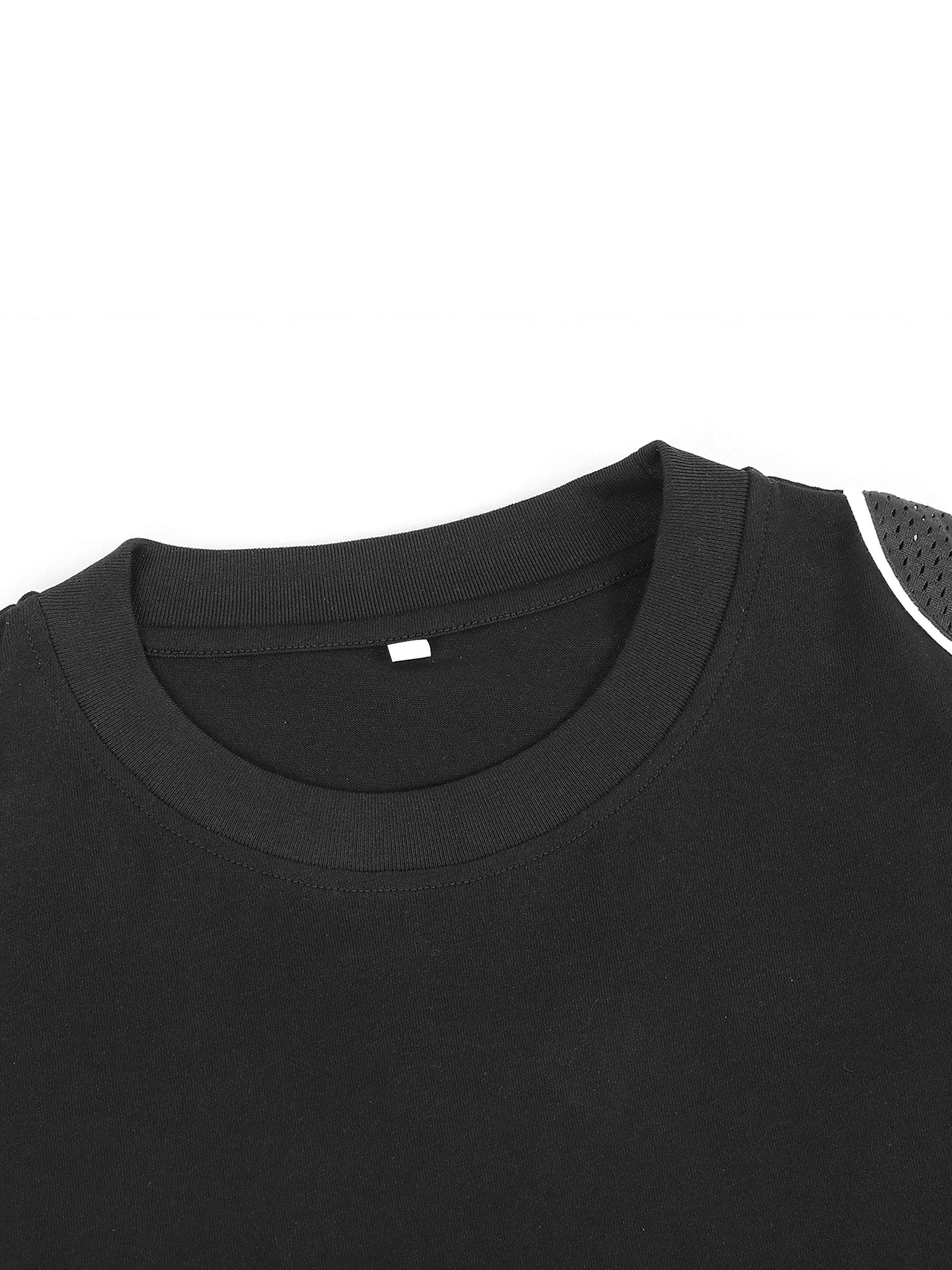 Unisex black t-shirt with contrast piped panel, round neck, and loose fit design.