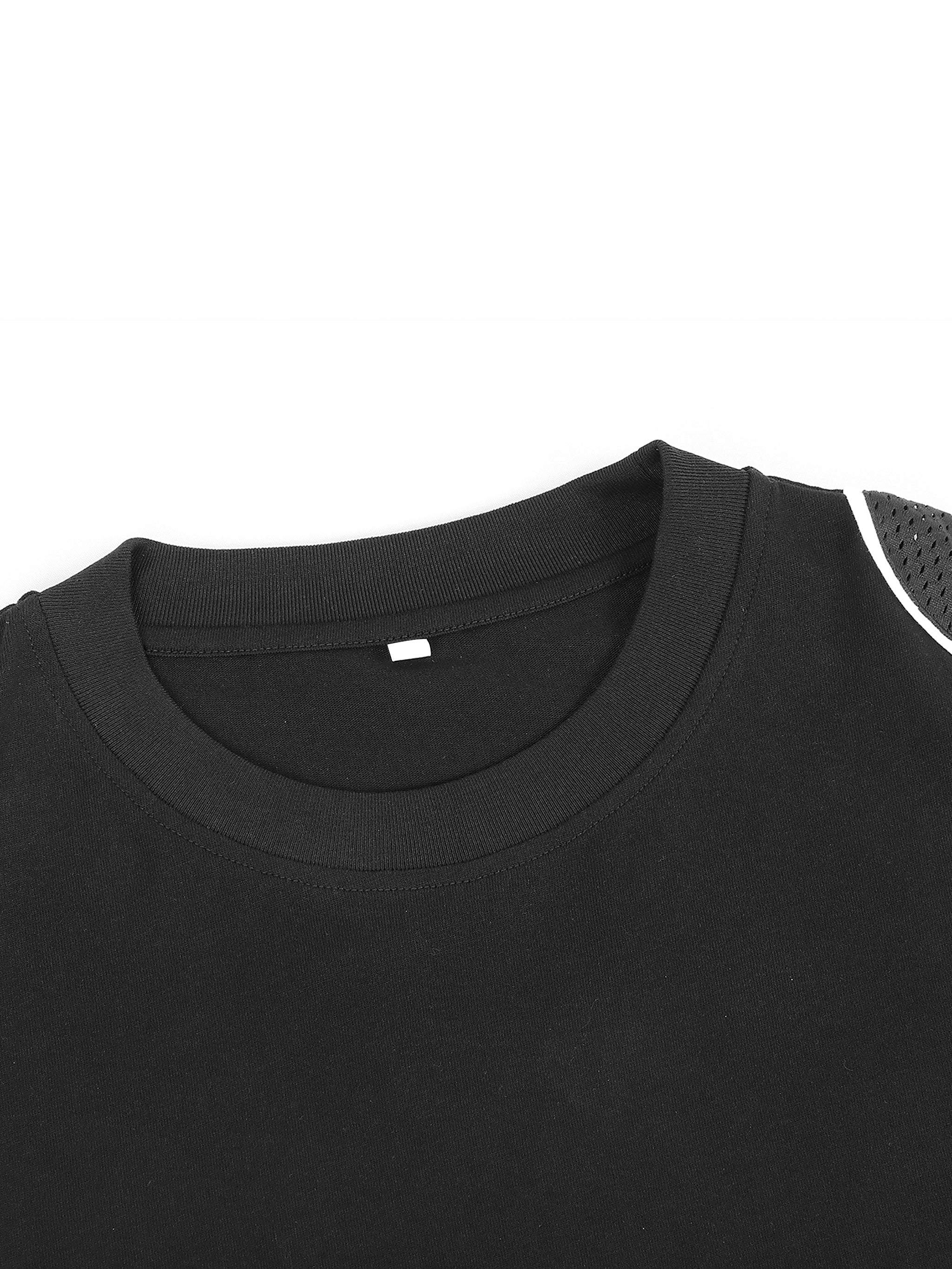 Unisex black t-shirt with contrast piped panel, round neck, and loose fit design.